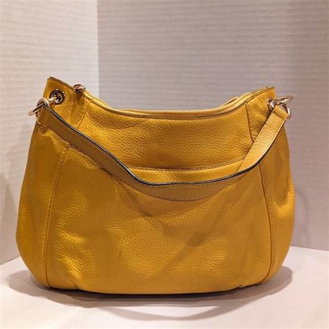 canary yellow michael kors clutch|Michael Kors Canary Yellow Tussle Hobo Handbag .